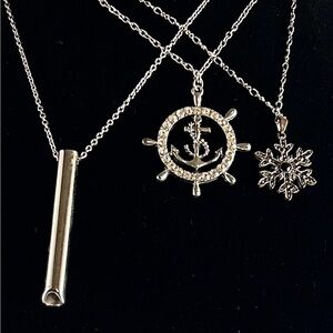 3- Silver colored necklaces